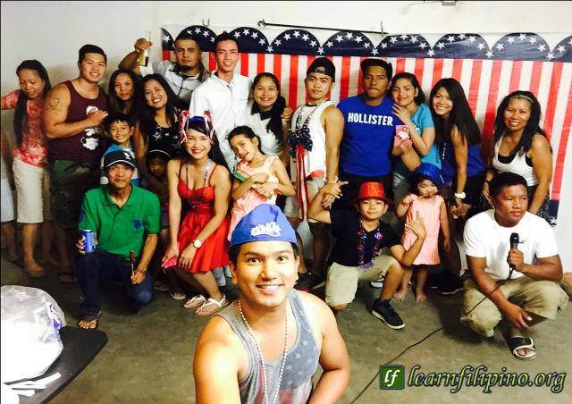 Filipinos from Delano, California – Filipinos love to have FUN! They are good of holding big parties, preparing foods and Karaoke. SELFIE shots are always a part of good parties :) – Photo by Justin Carinio Julian